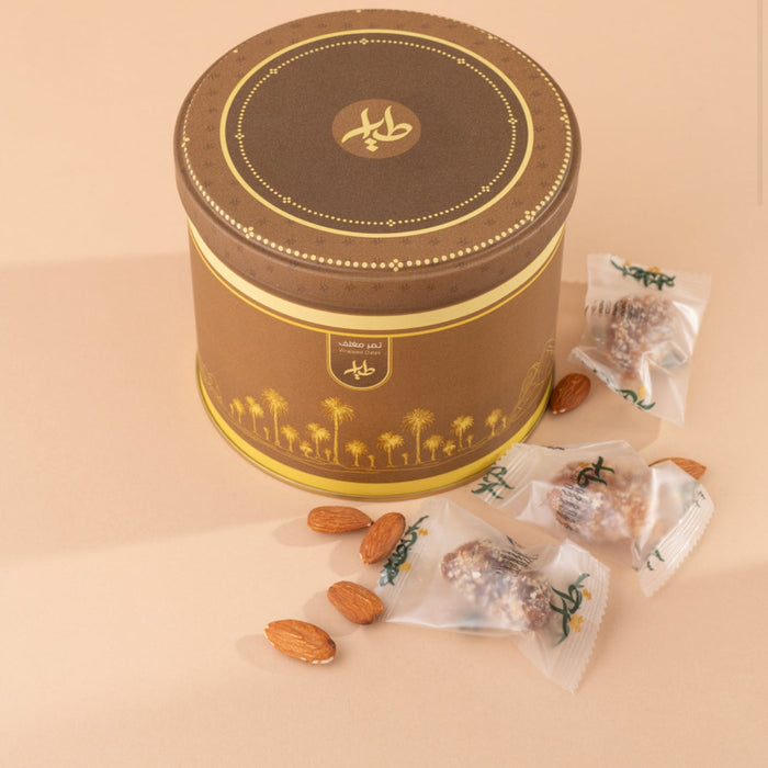 Al-Tayyar - Khalas Dates Stuffed with Almonds & Coated with Coconut | الطيار - تمر خلاص محشي باللوز ومغطى بجوز الهند