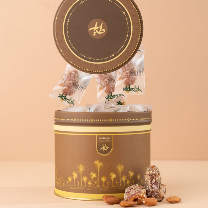 Al-Tayyar - Khalas Dates Stuffed with Almonds & Coated with Coconut | الطيار - تمر خلاص محشي باللوز ومغطى بجوز الهند