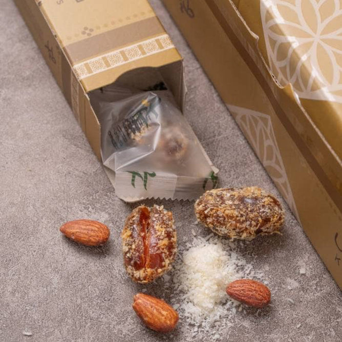 Al-Tayyar - Five dates coated with coconut and wrapped
